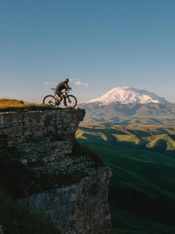 Cyclist admiring the view of the French Pyrenees 