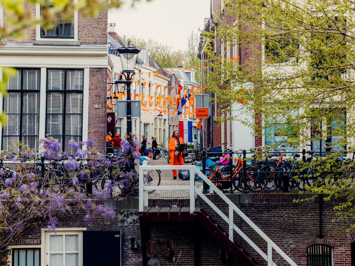 a street in Amsterdam during King's Day (Koningsdag), a national holiday in the Netherlands