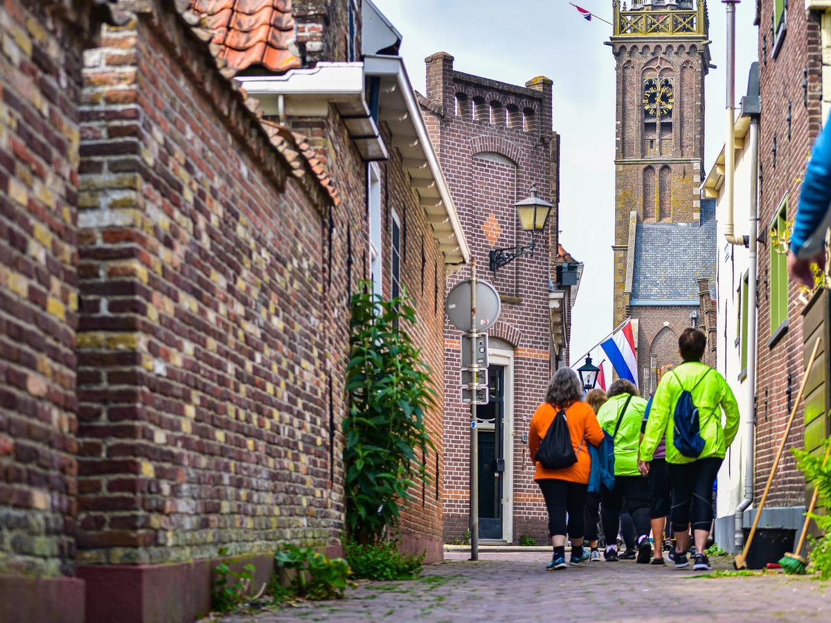 Guests walking through Edam