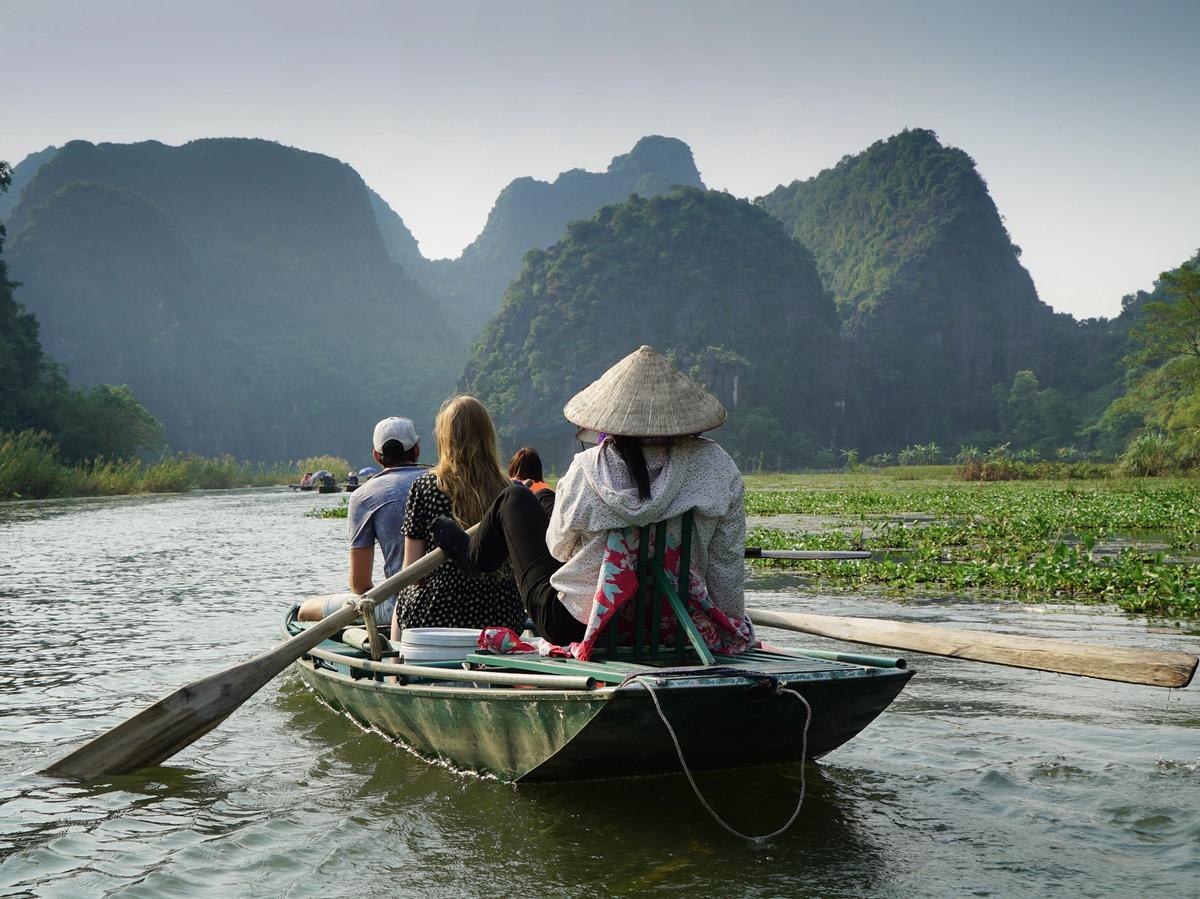 a scenic boat ride through Tam Cốc-Bích Động in Ninh Bình Province, Vietnam