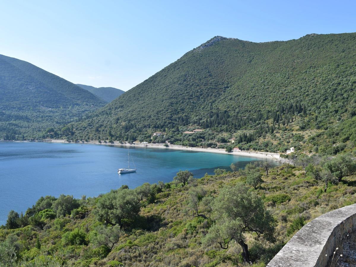 Mprosta Aetos Beach in Ithaca, Greece, associated with the Ionian Islands, a group of islands known for their natural beauty and clear waters