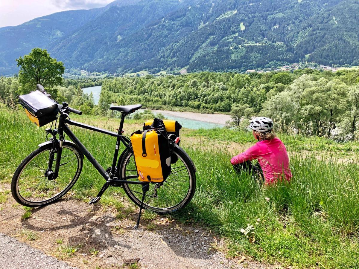 a moment on the Alpe Adria Cycle Path (Alpe-Adria Radweg), a renowned long-distance cycling route connecting Austria and Italy