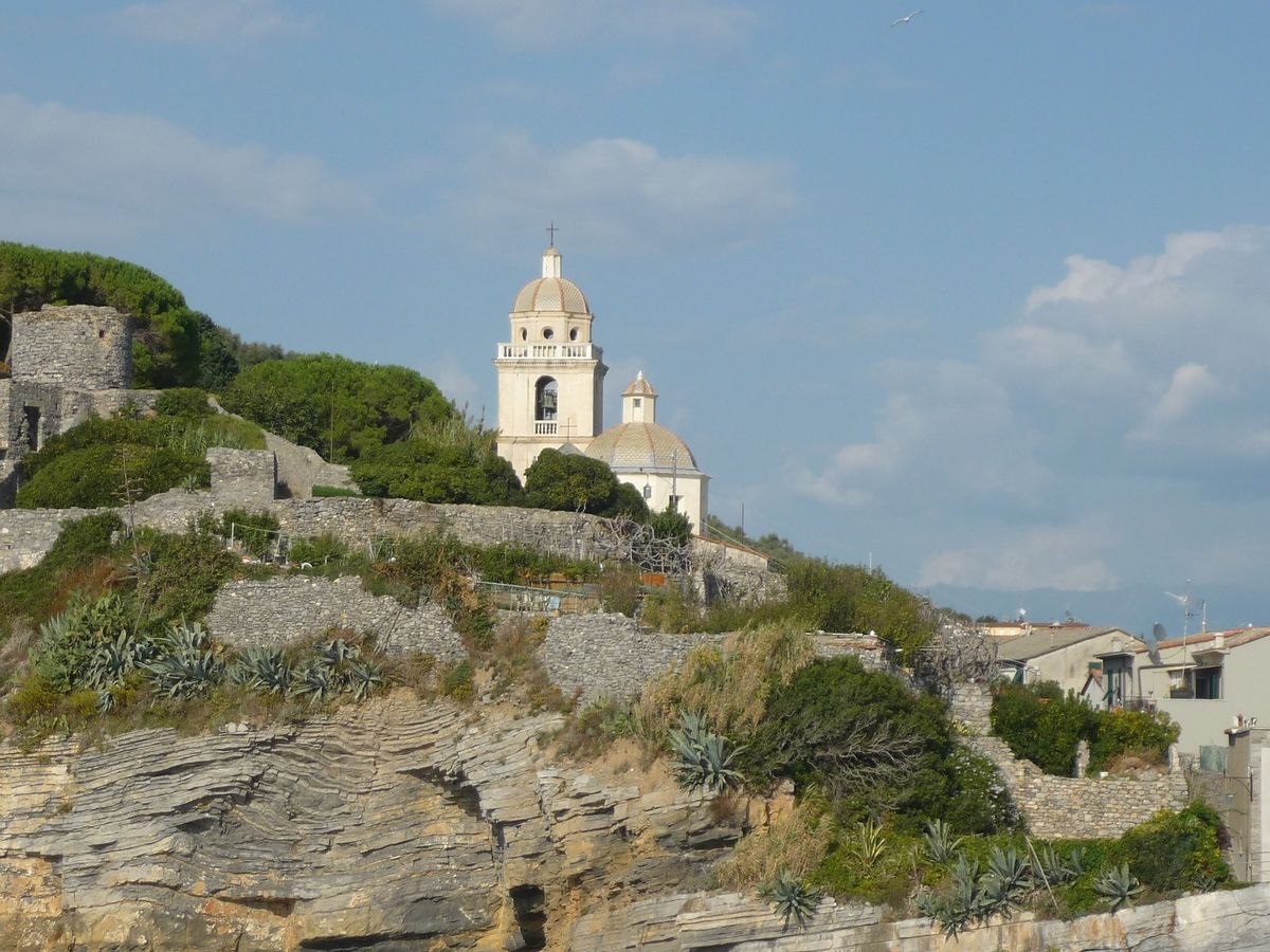 the Church of San Pietro in Porto Venere, Italy, a historic church perched on a rocky promontory overlooking the Gulf of Poets