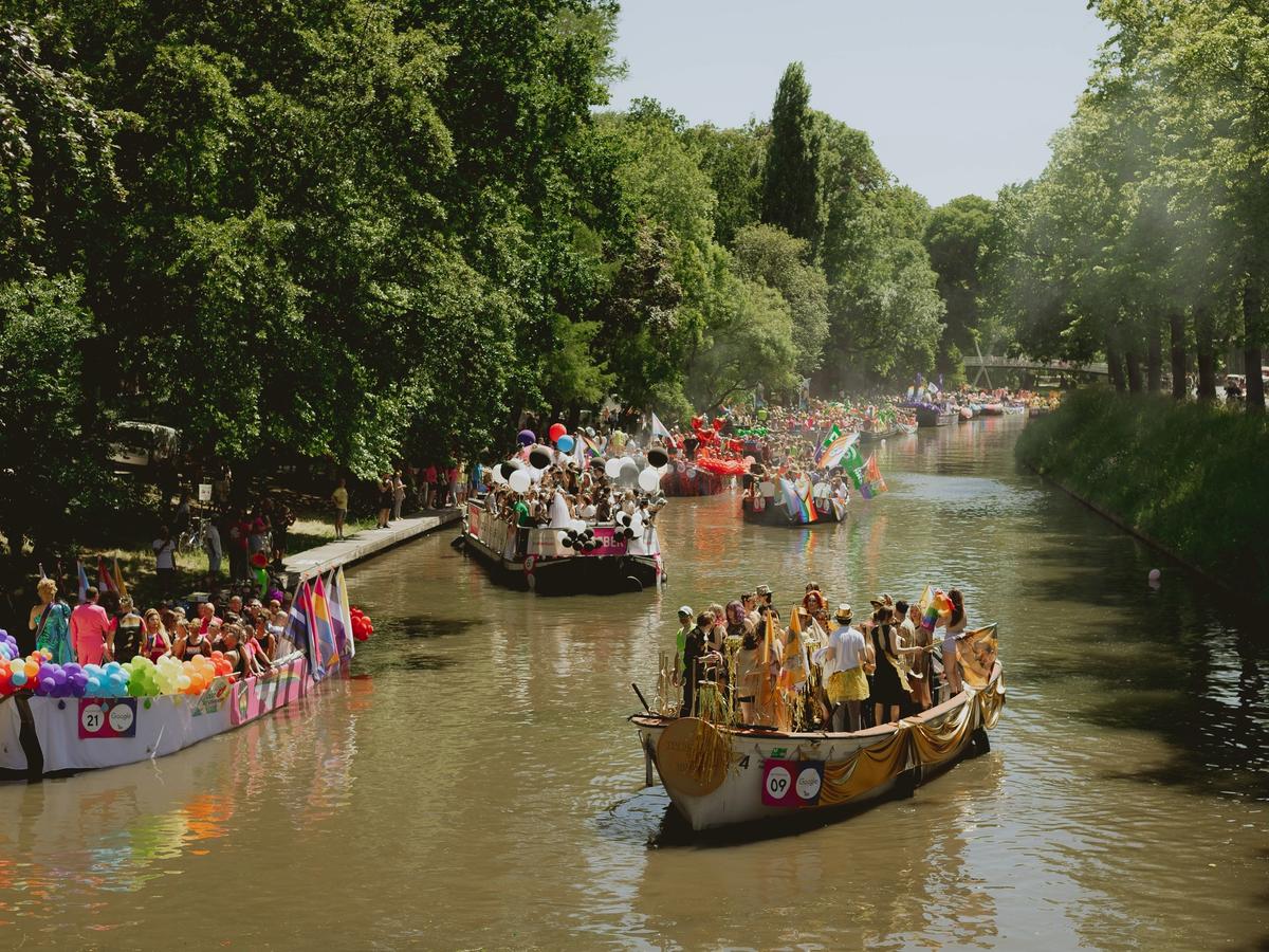 the Canal Parade, the main event of Amsterdam Pride, which is a citywide LGBTQ+ festival held annually in Amsterdam, Netherlands