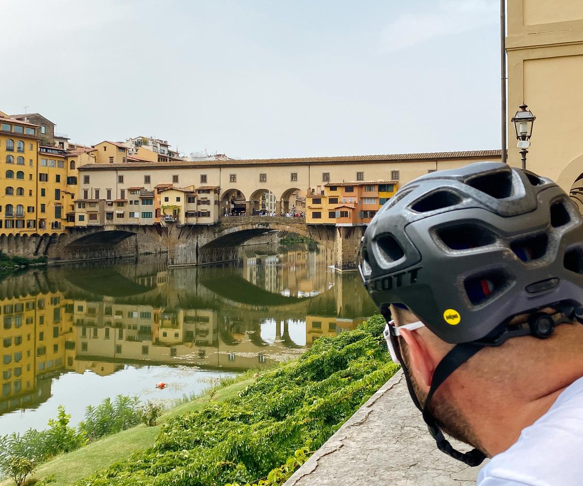 Cycling Ponte Vecchio Bridge in Florence