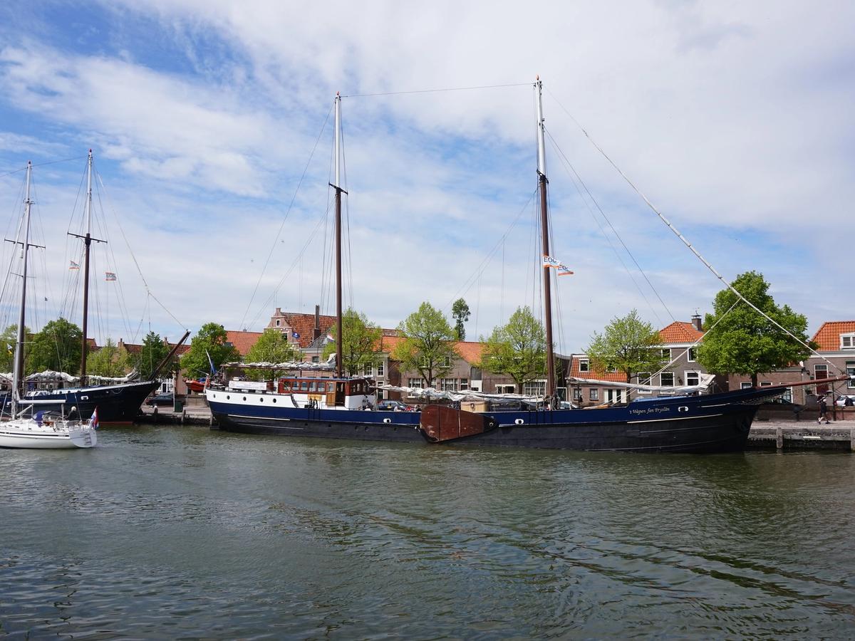 the Wapen fan Fryslân, a large two-masted schooner sailing on Dutch waterways