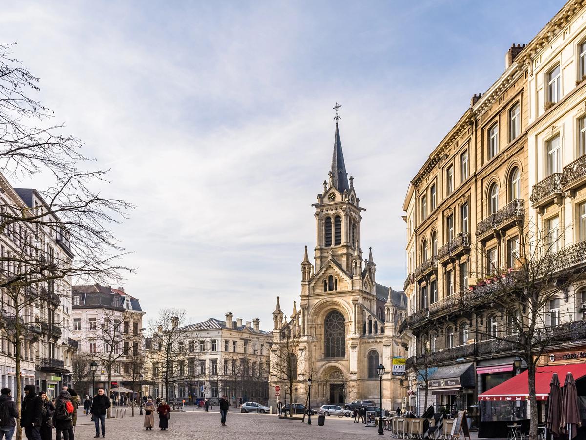 the Parvis de Saint-Gilles (Saint-Gilles Forecourt) in Brussels, Belgium, with the Church of Saint-Gilles at its center