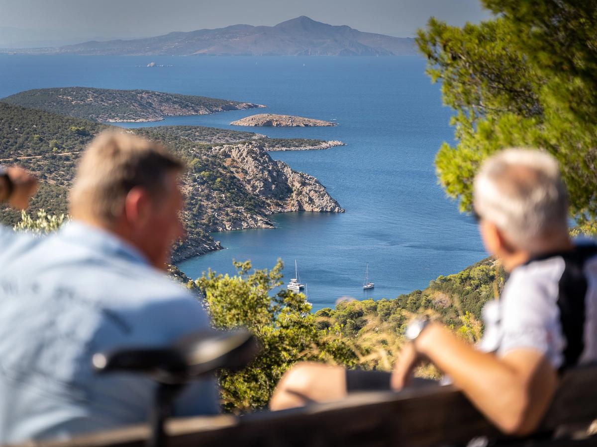 a scenic view of the Saronic Gulf in Greece, possibly near the Peloponnese peninsula or one of the Saronic Islands like Poros or Aegina