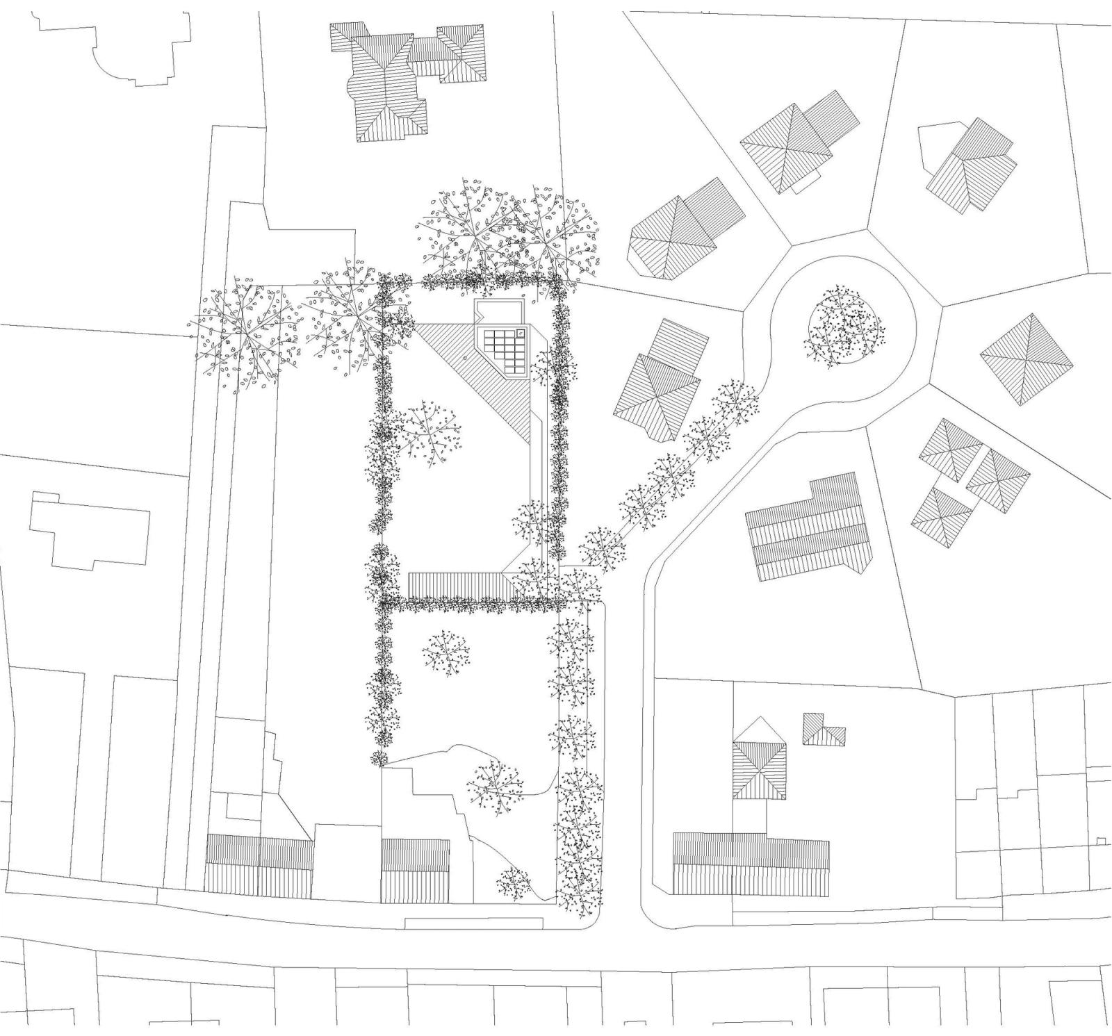 Site plan of the angular house among mature garden trees