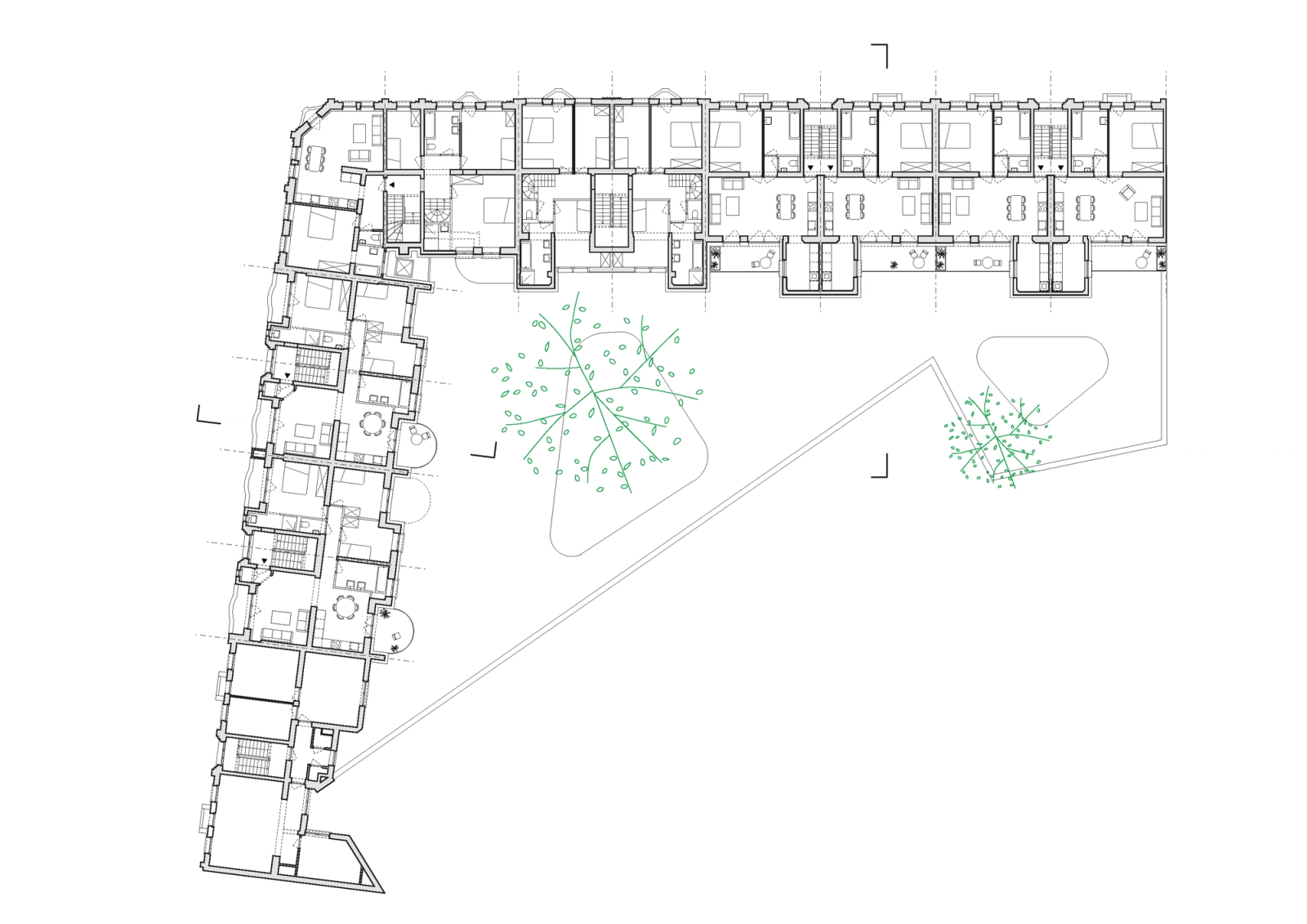 Residential floor plan around the open triangular site