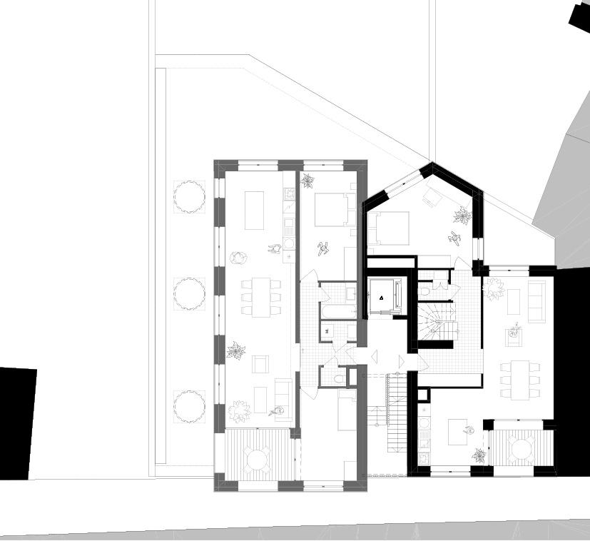 Apartment floor plan organized around a central stair and core