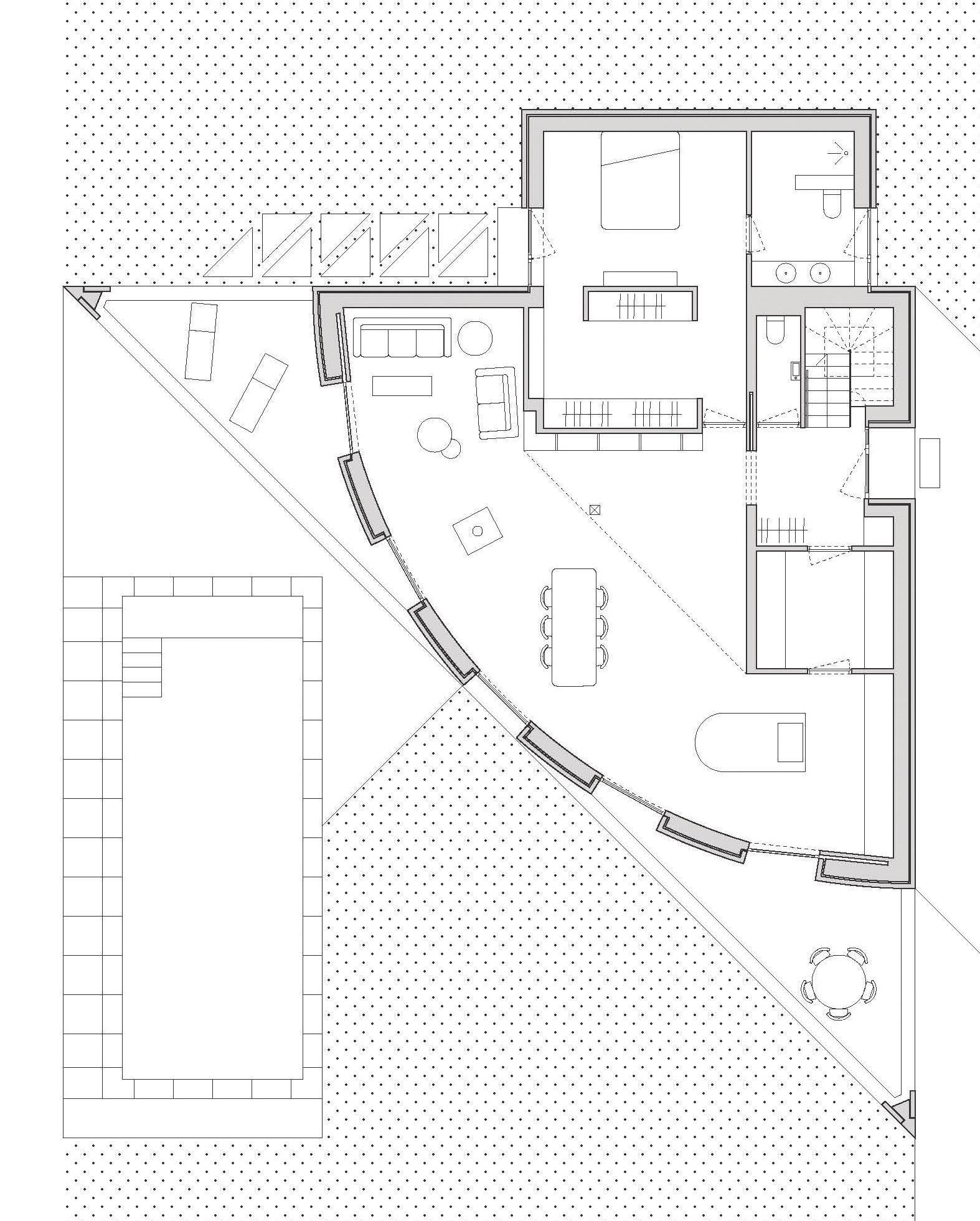 Ground-floor plan fitted within the triangular site boundary