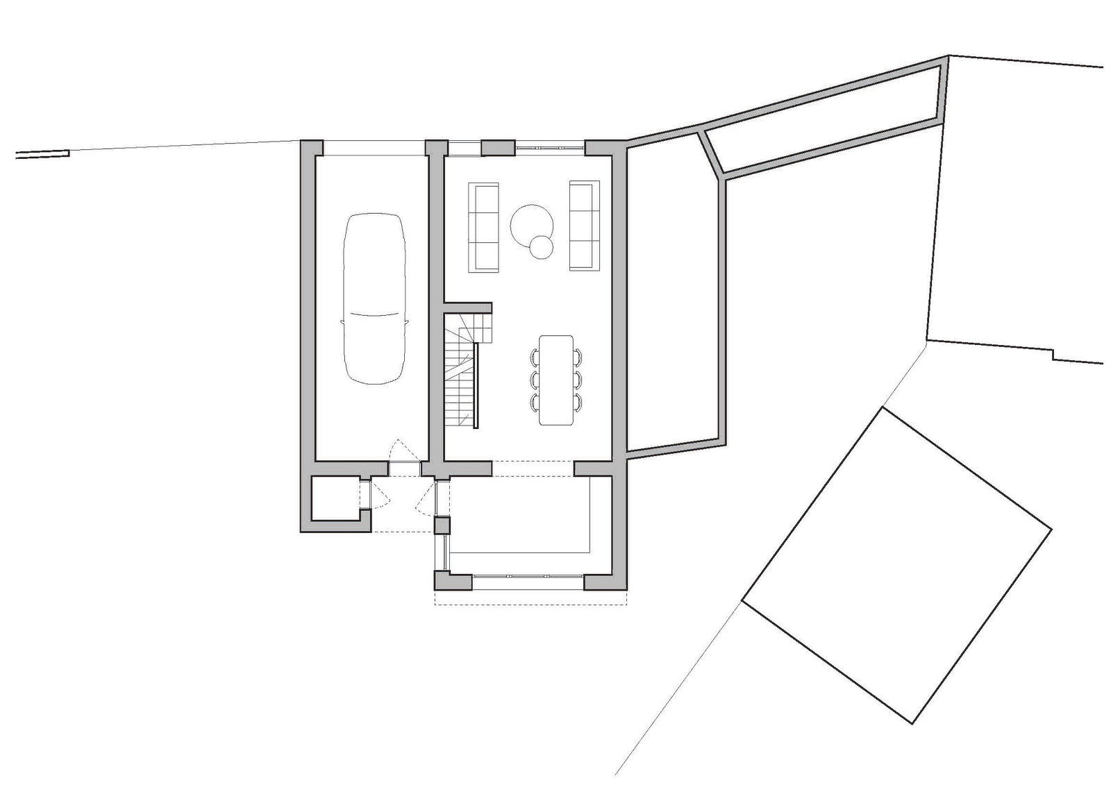 Lower floor plan organized around a central stair and dining room