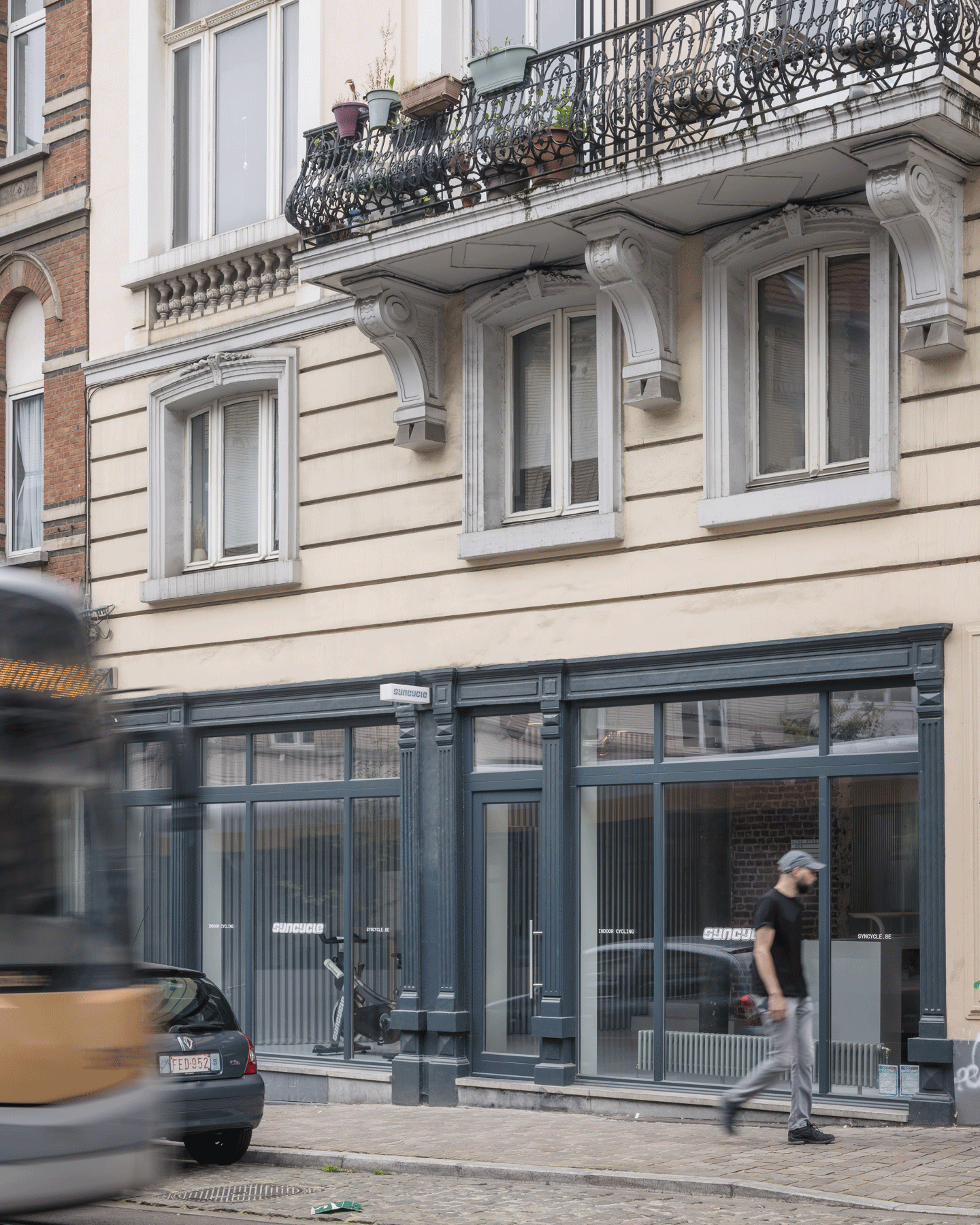 Street view of the dark glazed gym storefront