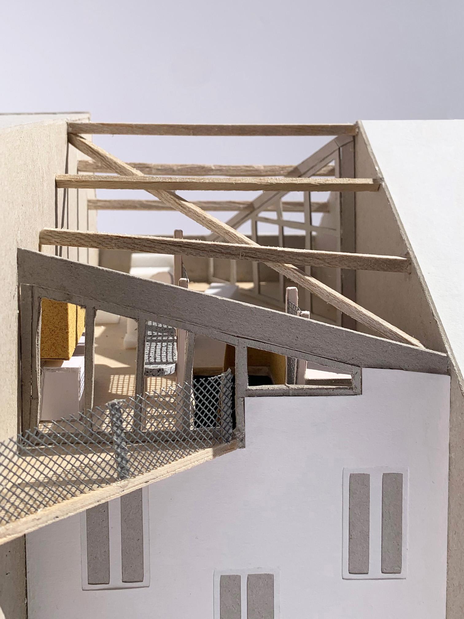 Cutaway physical model of the timber roof structure and mesh stair