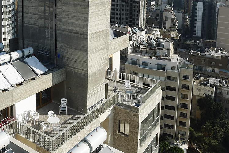 Aerial view across roof terraces and service structures