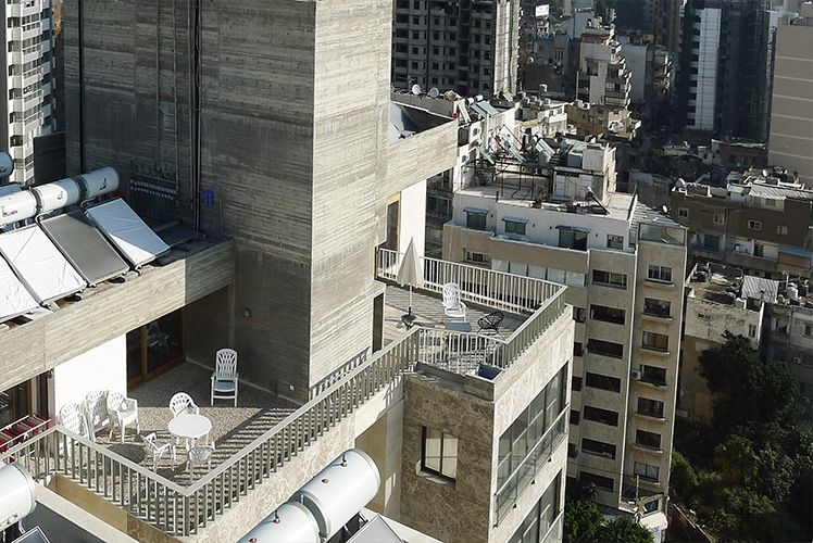 Aerial view across roof terraces and service structures