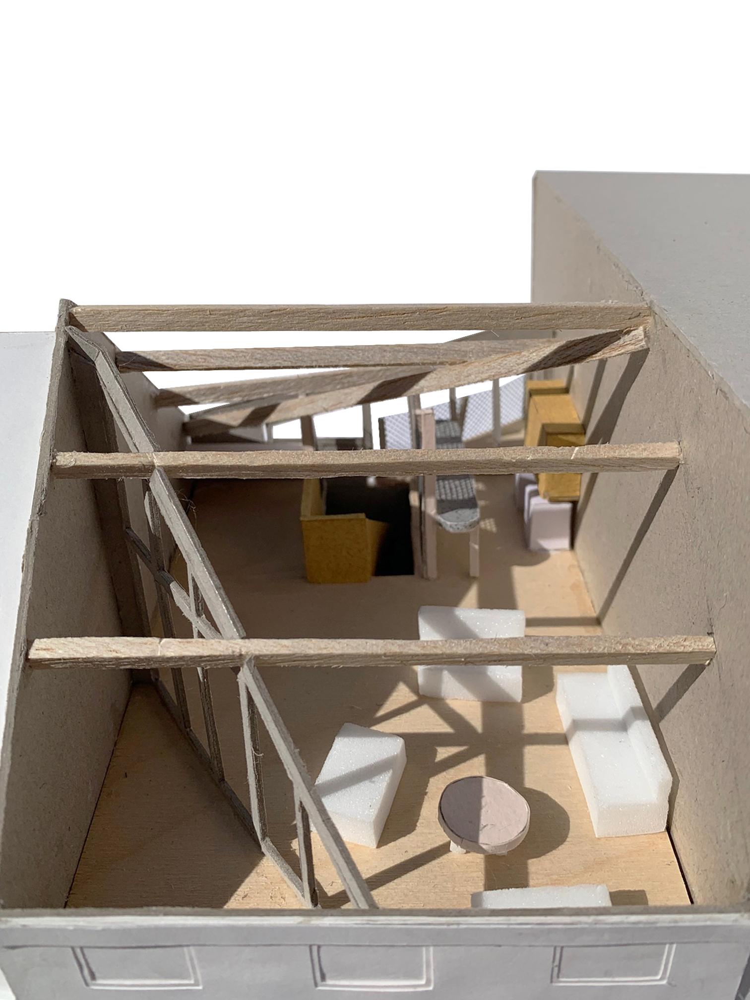 Cutaway interior model with a timber frame and circular elements