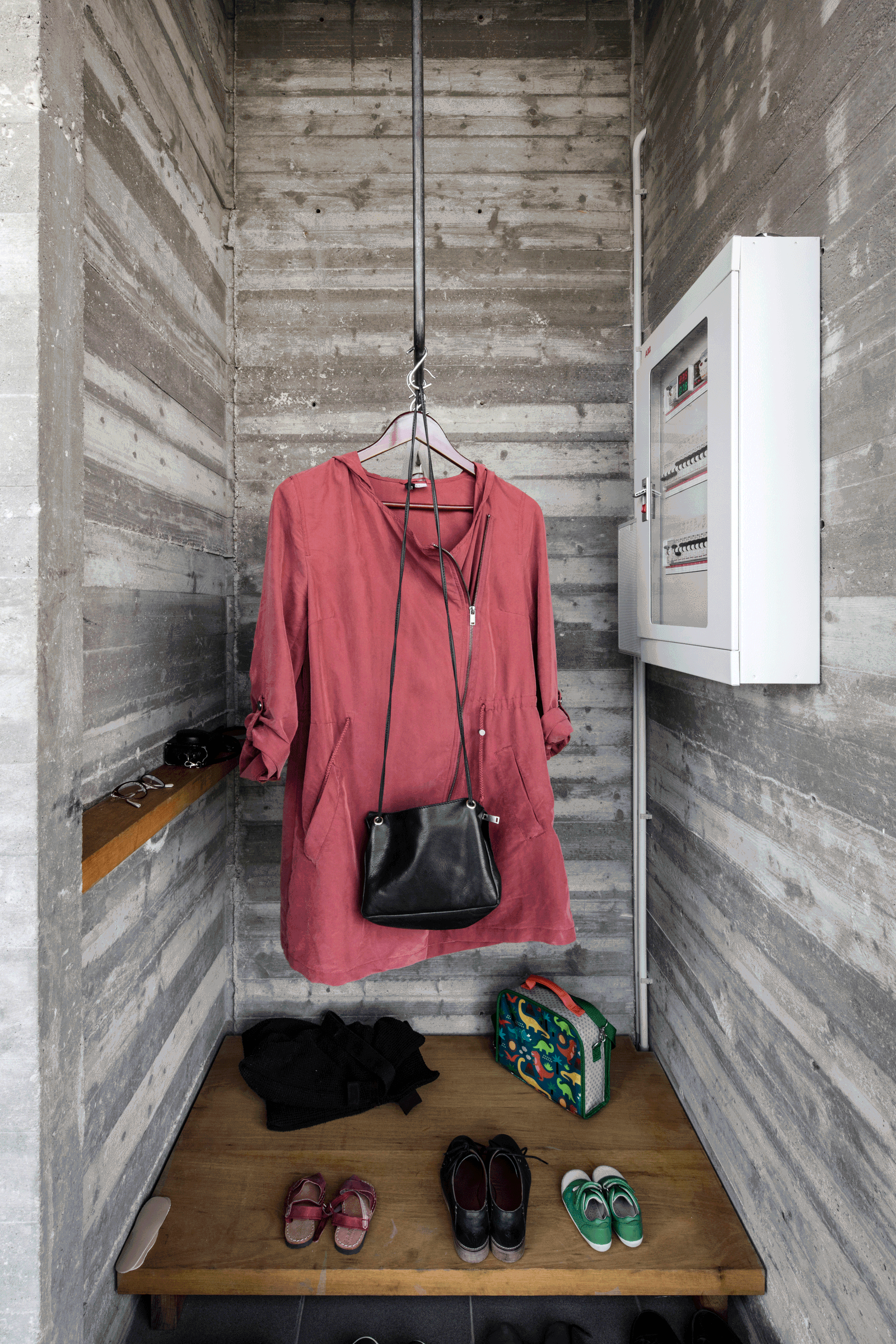 Entrance niche with timber bench, coat hooks and storage