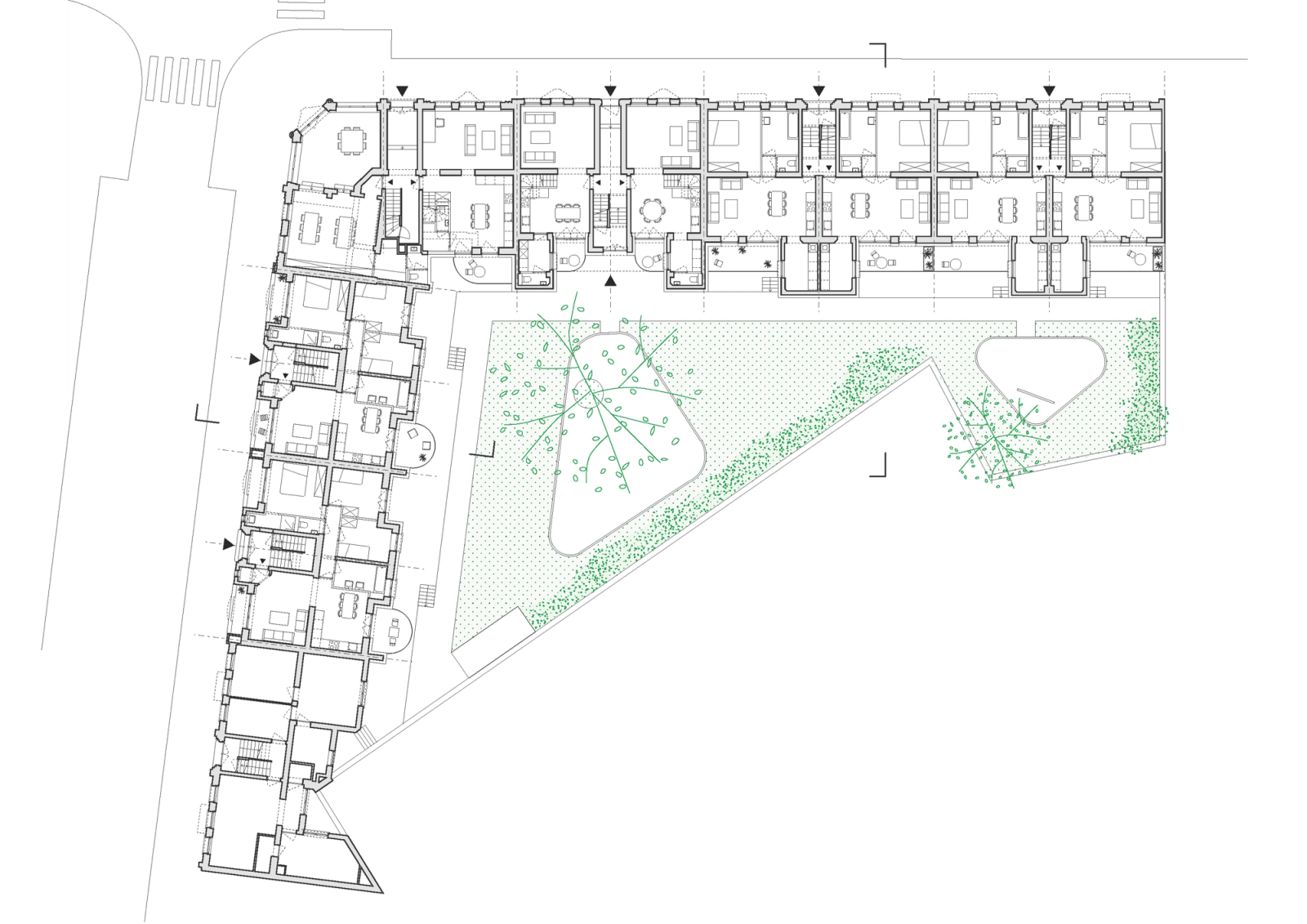 Ground plan of an L-shaped housing block around a green courtyard