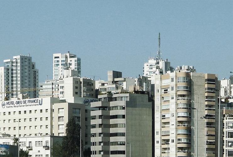 City skyline of closely packed mid- and high-rise buildings