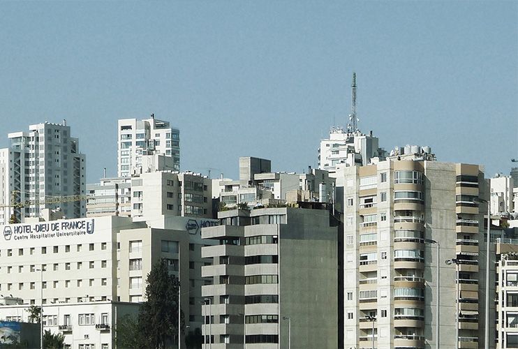 City skyline of closely packed mid- and high-rise buildings