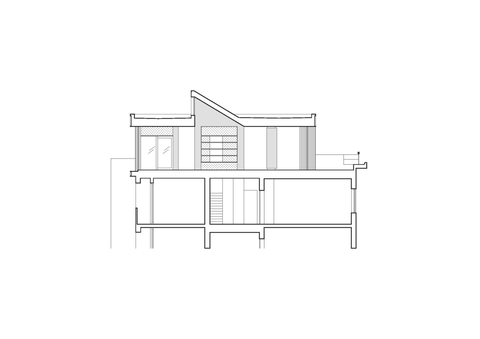 Longitudinal section through the rooftop addition and central stair