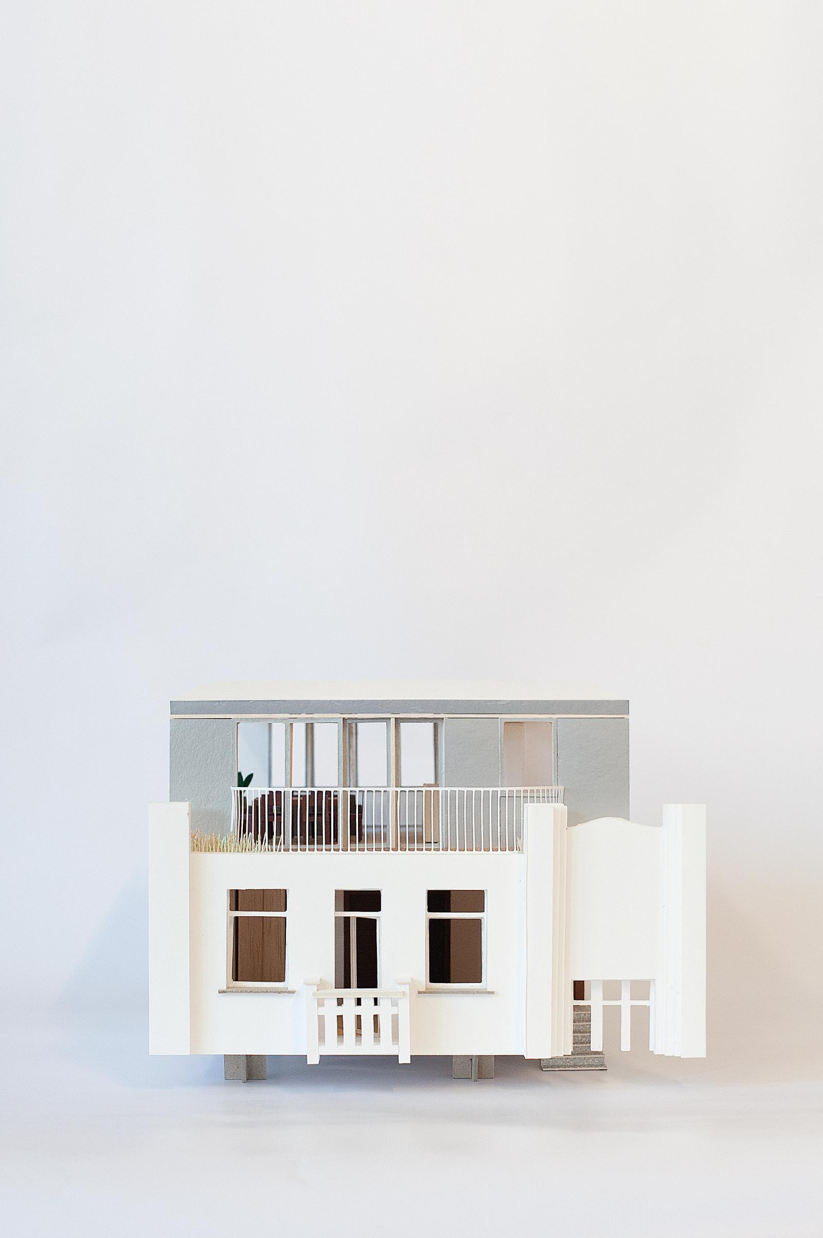 Physical façade model combining the retained front and new rear volume