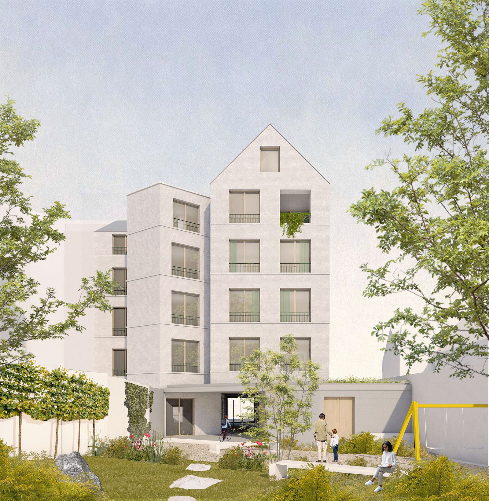 Rear garden view of the pale gabled apartment building