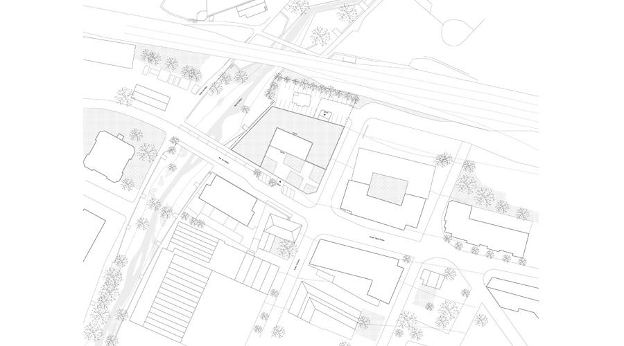 Site plan locating the courtyard block within the surrounding district