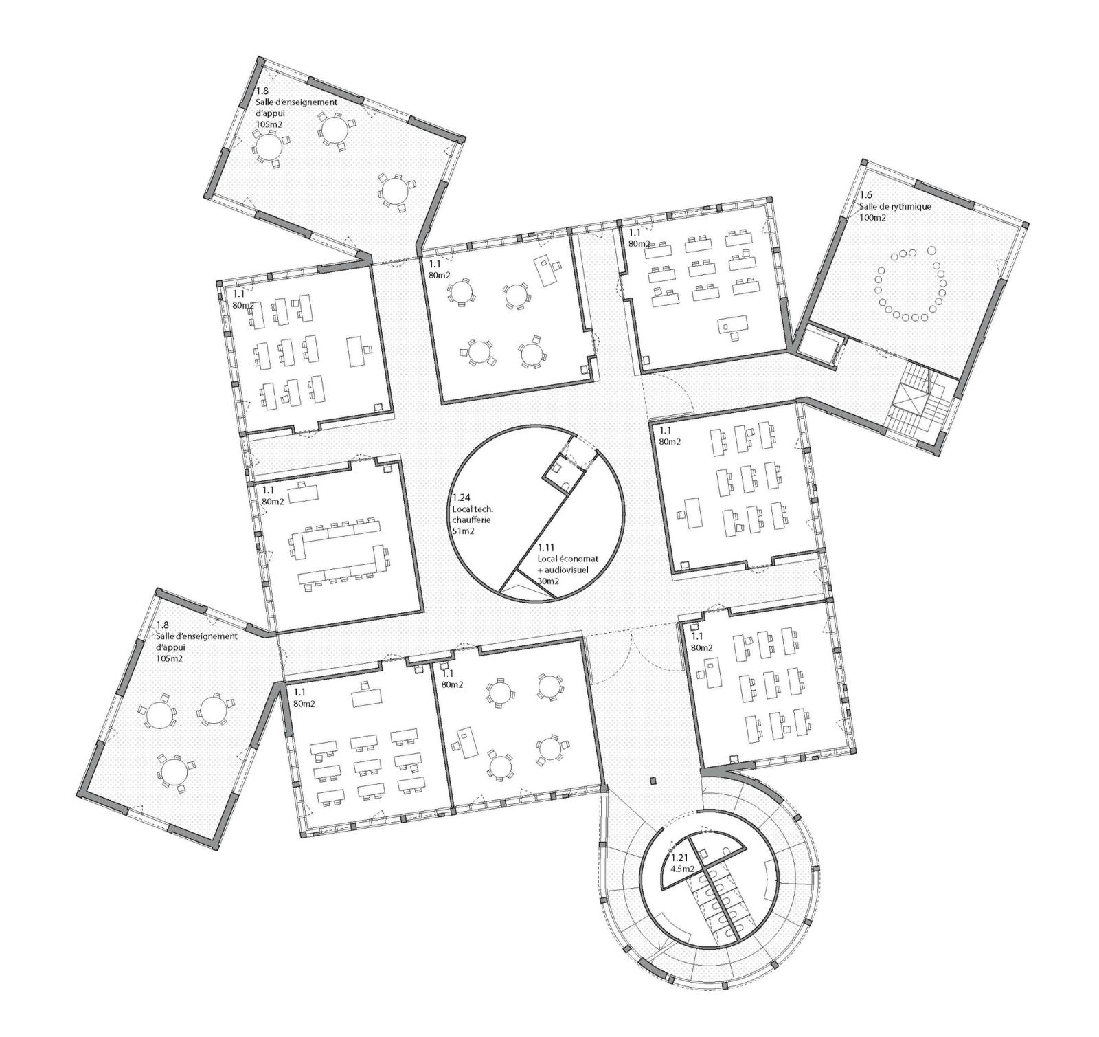 Floor plan with classrooms and offices around a central stair