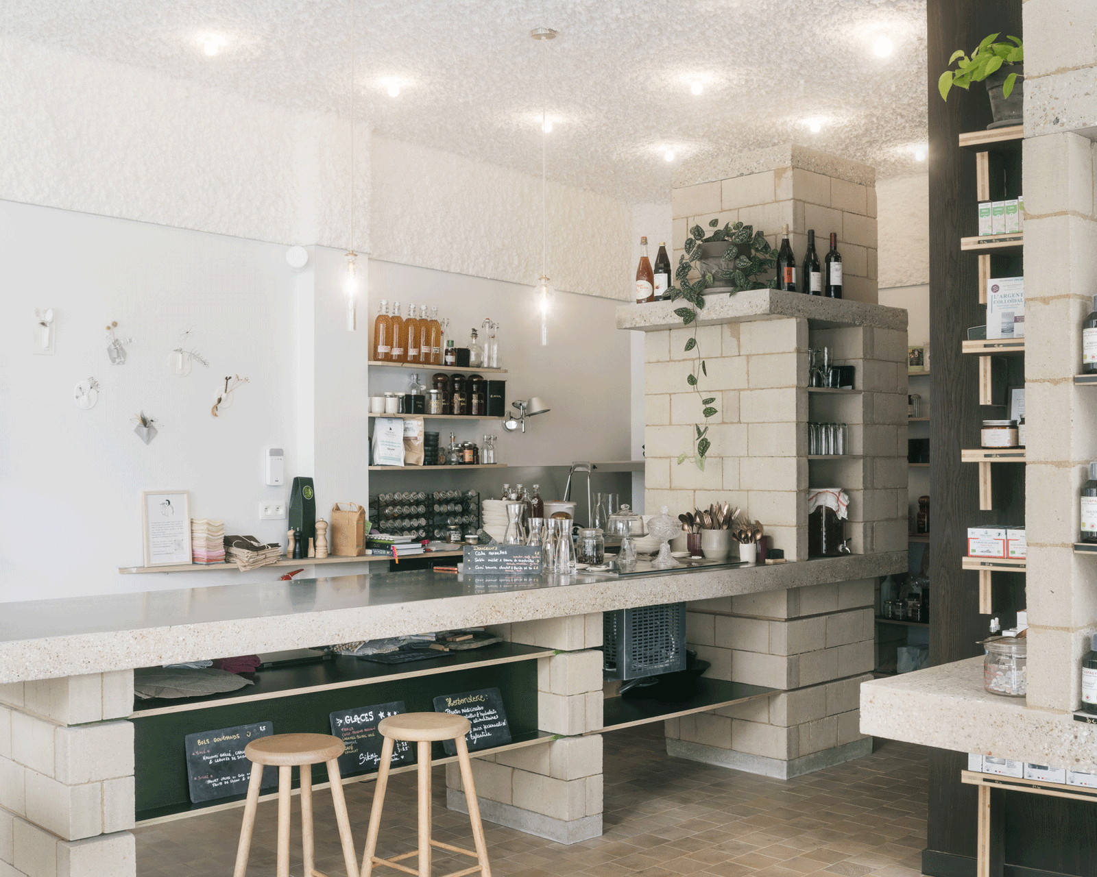 Service counter built from terrazzo blocks and a pale stone top