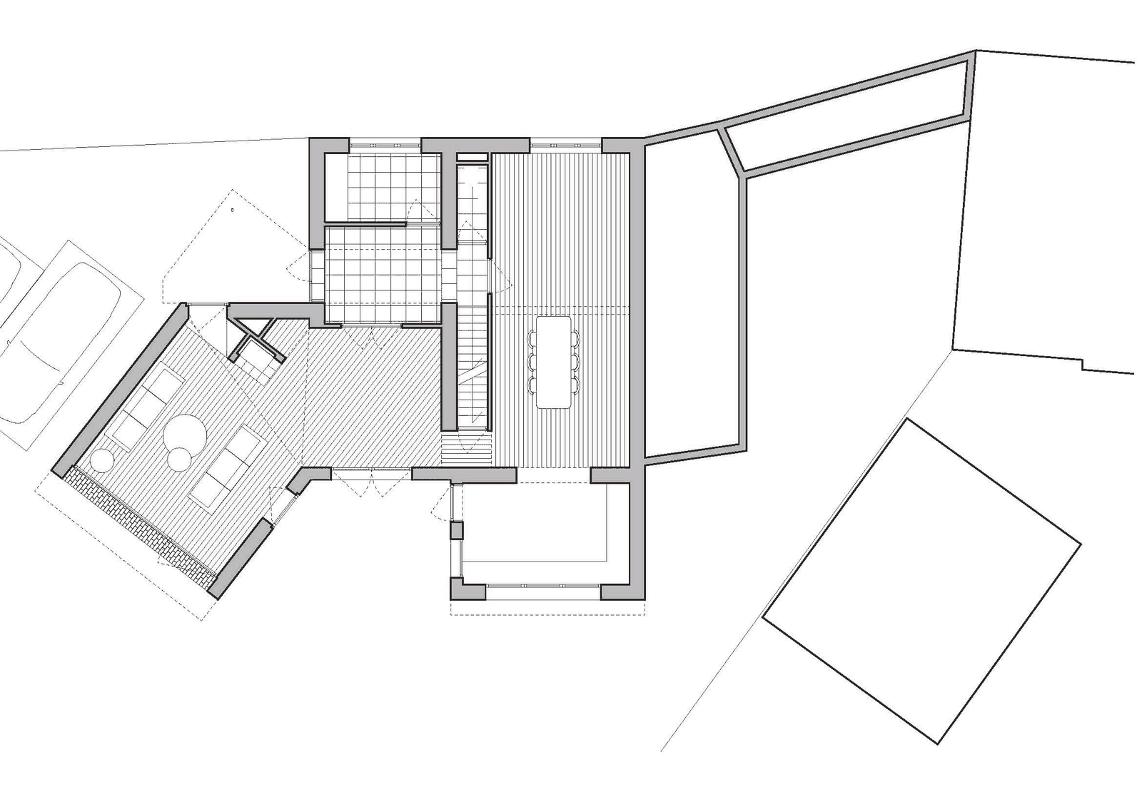 Floor plan of a house with an angled garden room and patio