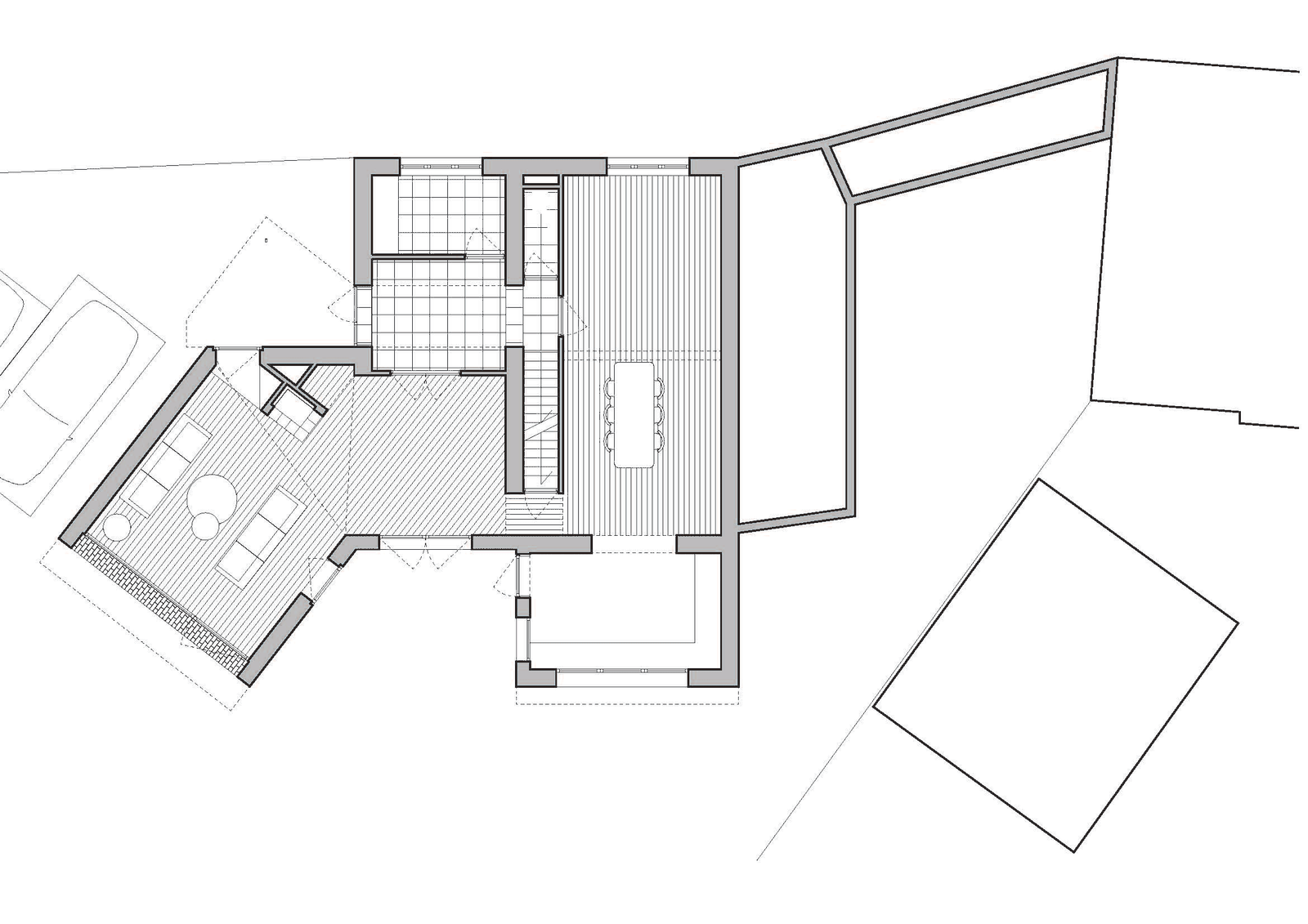 Floor plan of a house with an angled garden room and patio