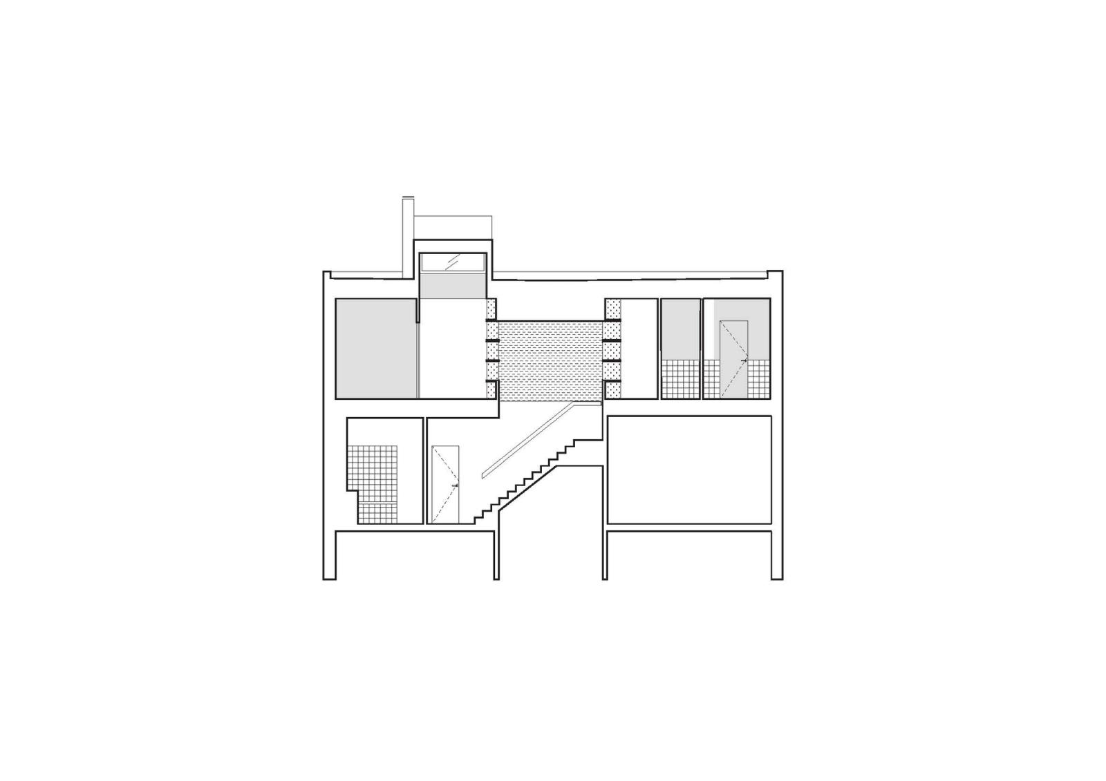 Building section through the stair and split-level interior rooms