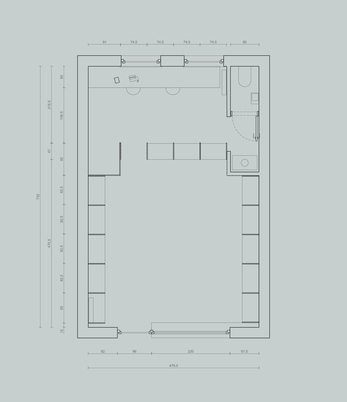 Plan of a rectangular shop lined with perimeter shelving