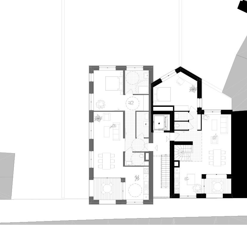 Upper apartment plan arranged around the central circulation core