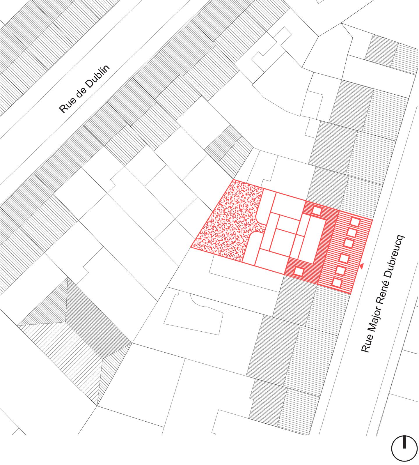 Site plan highlighting the building footprint in the urban block