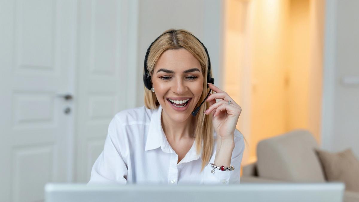 woman with headset laughing