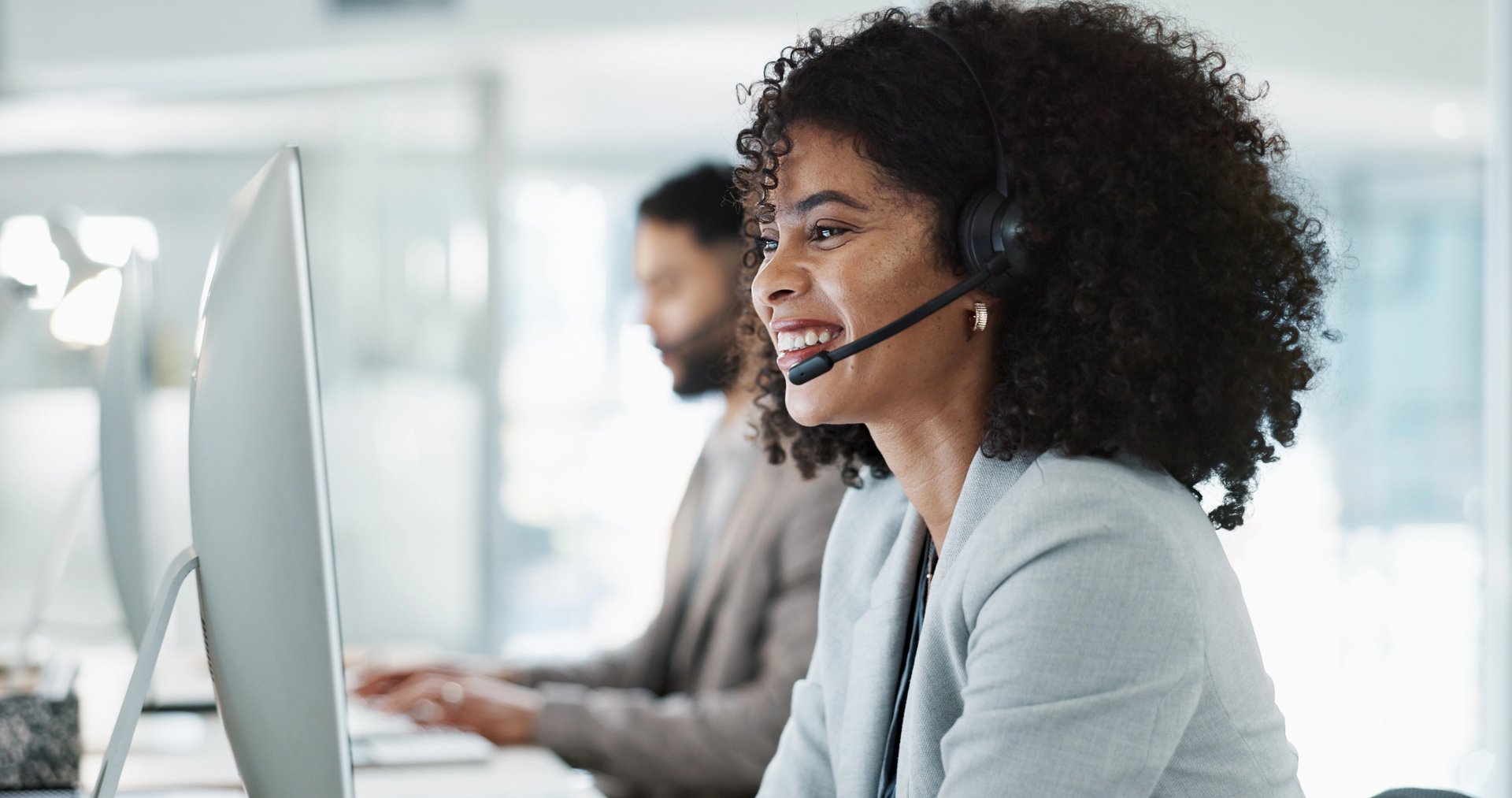 woman with headset laughing