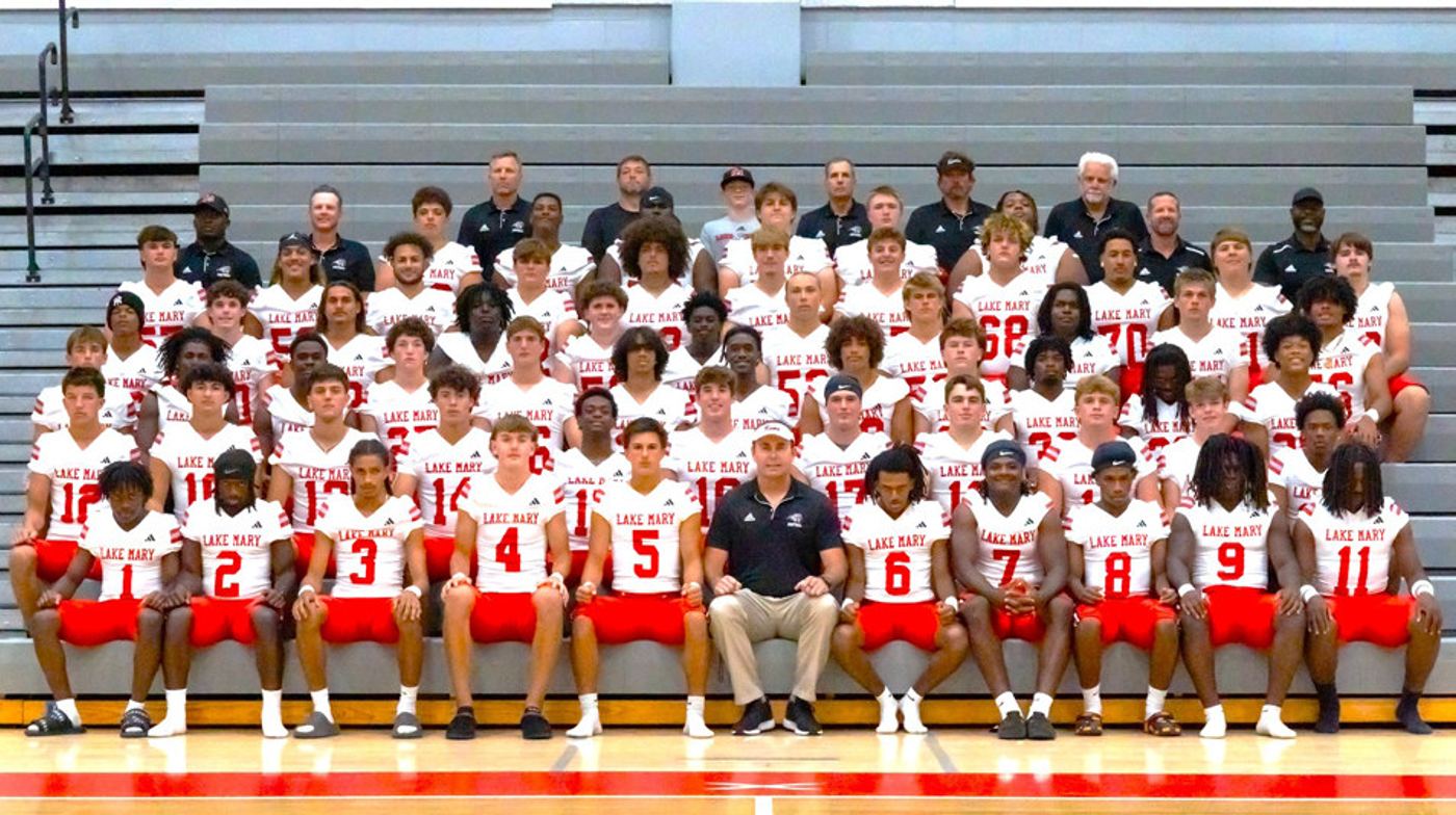 Coach Perry with Lake Mary’s championship football team