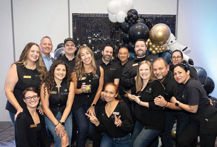 Celeste team members celebrate the hotel’s five years of serving the Central Florida community.