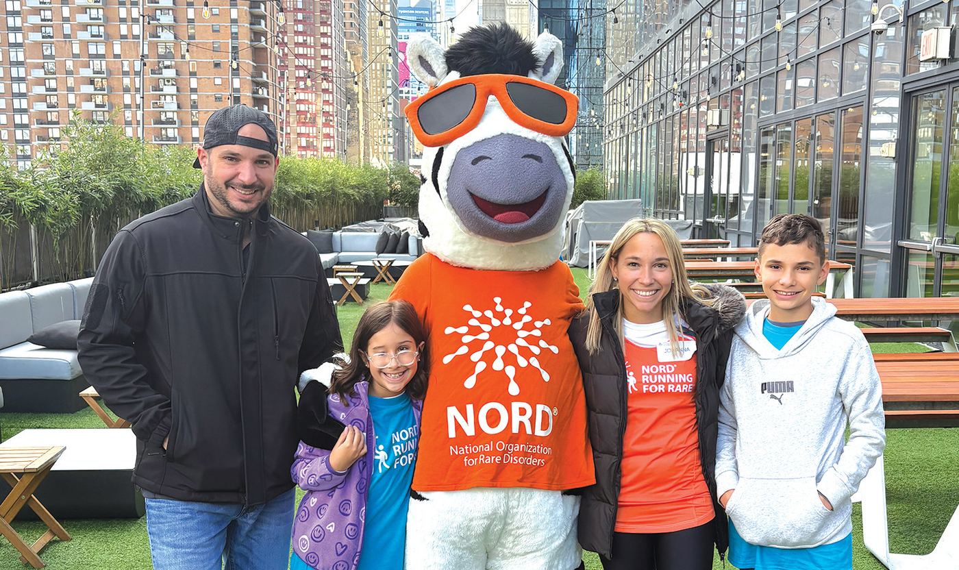 The Cilenti family: dad Anthony, daughter Ava, the NORD mascot, mom Johanna, and son Lucas.The zebra, known for its unique stripes, is the NORD mascot.