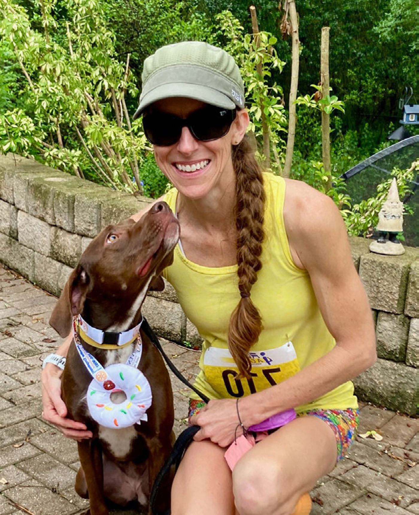 Jenn Bonaskiewich of Altamonte Springs with Pixie at the recent Doughnut Day 5K in Lake Mary