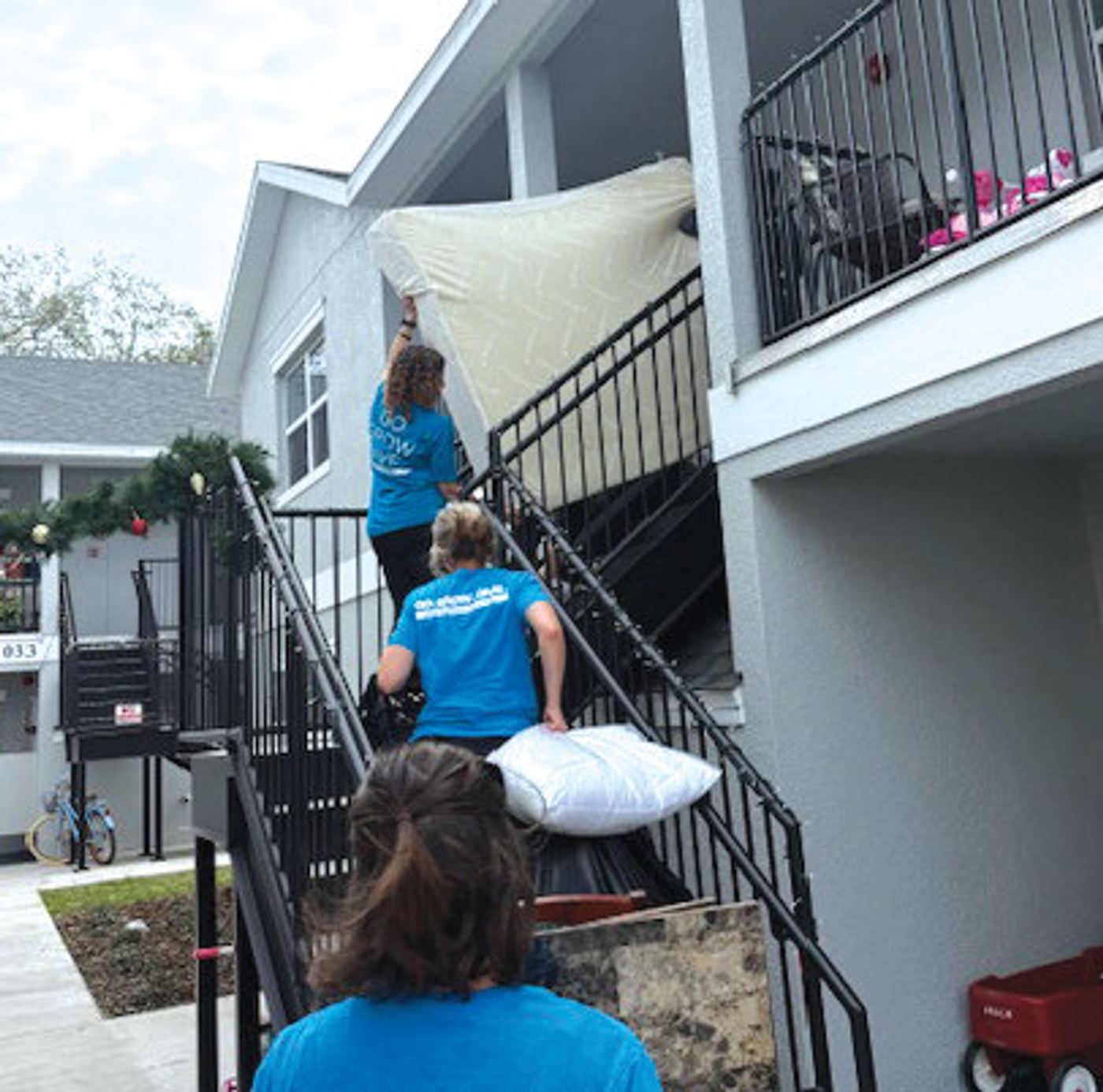 Volunteers with Annabel’s Closet on a furniture delivery day