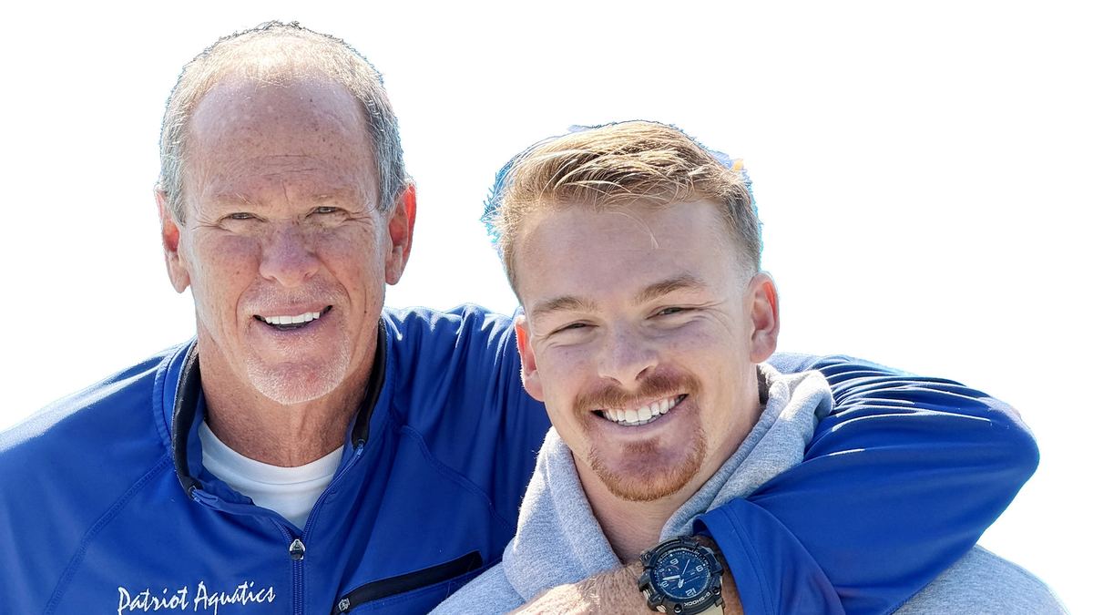 Clay with his son, Gabe Parnell, the new swim coach at Lake Brantley