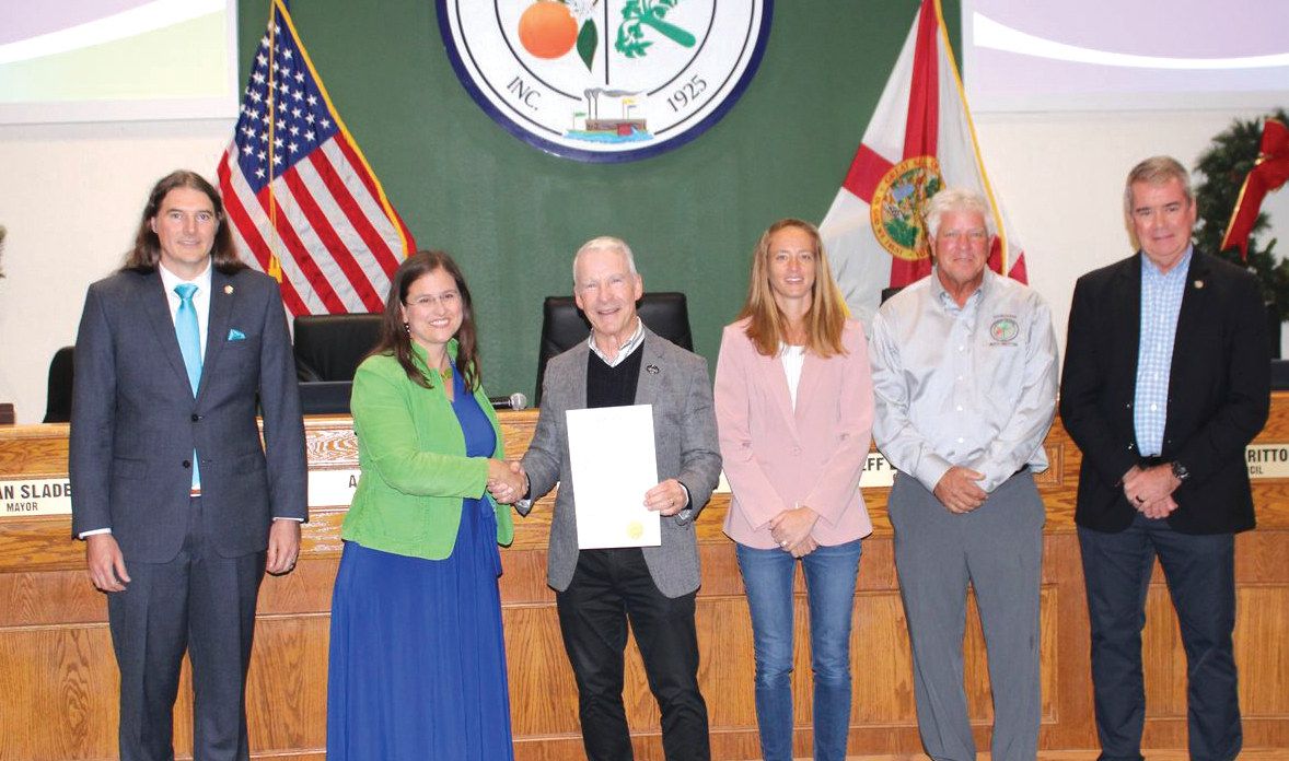 Pastor Joel with the Oviedo City Council during its signing of The Pledge