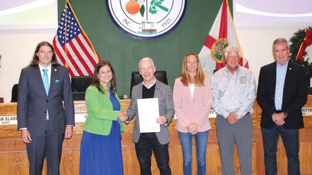 Pastor Joel with the Oviedo City Council during its signing of The Pledge