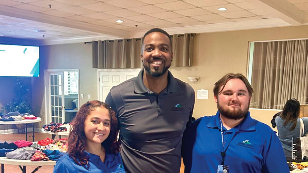 Adeemir Dacenay, the county’s recycle program coordinator, with interns and University of Central Florida students Natalia Palacois and Aidan Ruth
