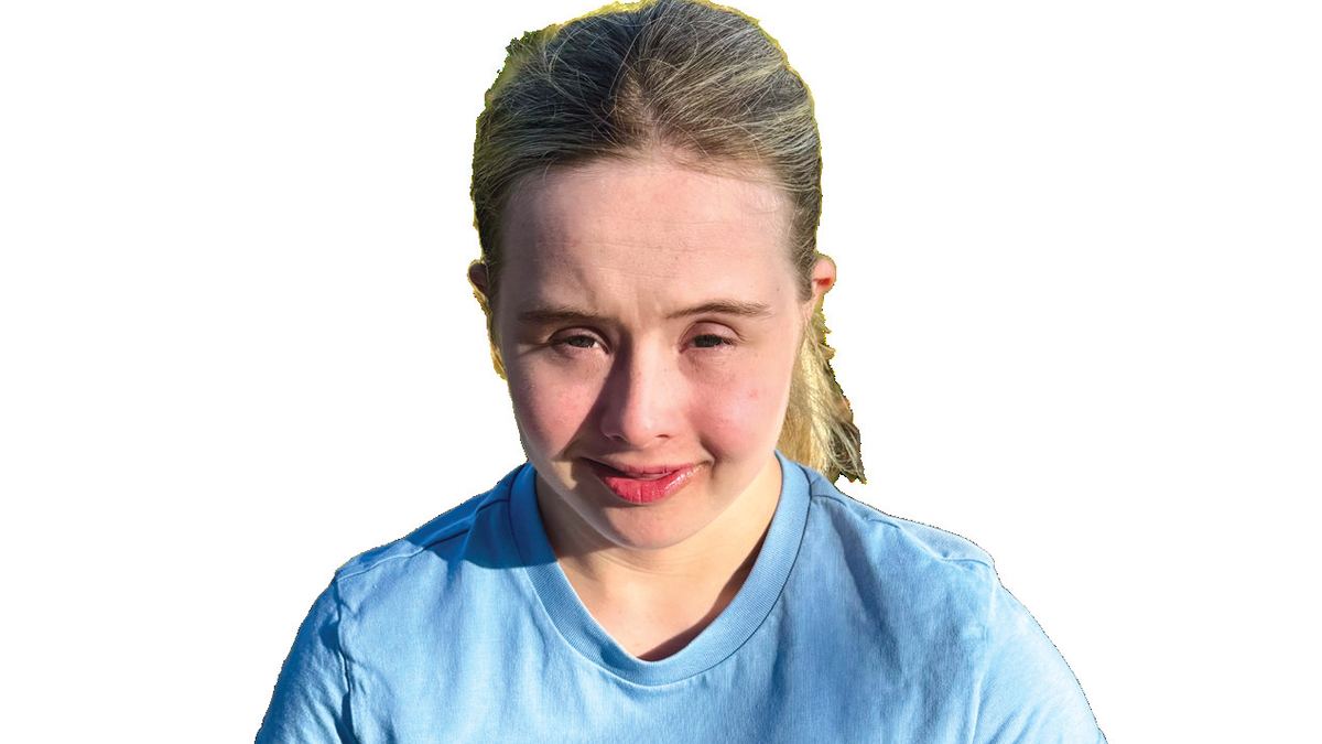 < Callie Anderson with the adaptive running shoe she helped test and market